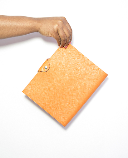 Hermes Ulysse Notebook Cover Togo Leather in Orange, front view